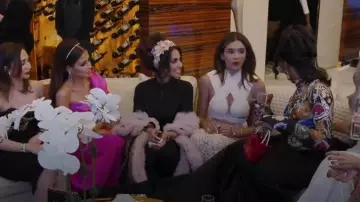Aavva Neoprene Tappered Gown With Ruffles Bell Sleeves worn by Sara Al Madani as seen in The Real Housewives of Dubai (S02E13)