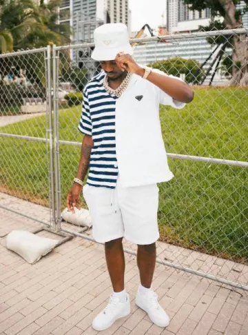 Prada Navy Striped & White Terry Double Match Shirt worn by Lil Tjay on the Instagram account @liltjay