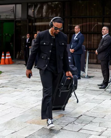 Versace Black Boucle Tweed Jacket worn by Jalen Hurts on the Instagram account @philadelphiaeagles