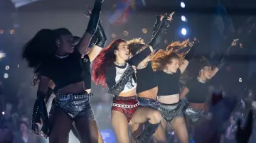 Dua Lipa wears Red Snake Skin Micro Shorts for her Glastonbury 2024 Live performance