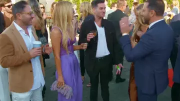 Benedetta Bruzziches Rhinestone Draped Clutch Bag worn by Tracy Tutor as seen in Million Dollar Listing Los Angeles (S15E10)