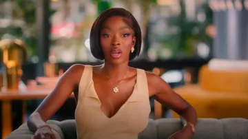 Van Cleef & Arpels Rose de Noel Mother of pearl Pendant worn by Chelsea Lazkani as seen in Selling Sunset (S08E08)