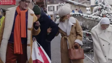 Maje Gapite Shearling Coat worn by Louise (Camille Japy) as seen in Emily in Paris (S04E06)
