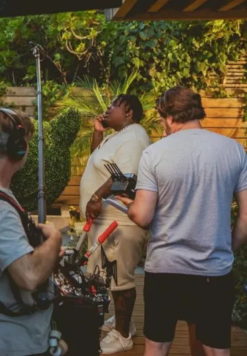 Amiri Cream Logo Embroidered Sweatshorts worn by BigXthaPlug on the Instagram account @bigxthaplug