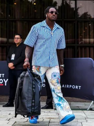 Kapital Tie Dye Patch Crazy Papillon Jeans worn by A. J. Brown on the Instagram account @philadelphiaeagles