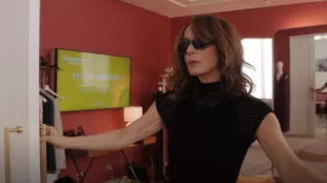 Versace Studded Medusa Biggie Sunglasses worn by Sylvie Grateau (Philippine Leroy-Beaulieu) as seen in Emily in Paris (S04E07)