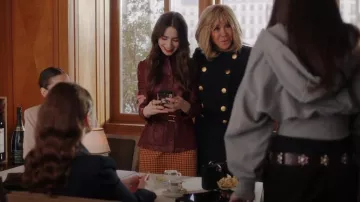Marni Orange Check Miniskirt worn by Emily Cooper (Lily Collins) as seen in Emily in Paris (S04E07)