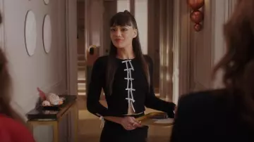 Kimchi Blue Peyton Bow Cardigan worn by Geneviève (Thalia Besson) as seen in Emily in Paris (S04E07)