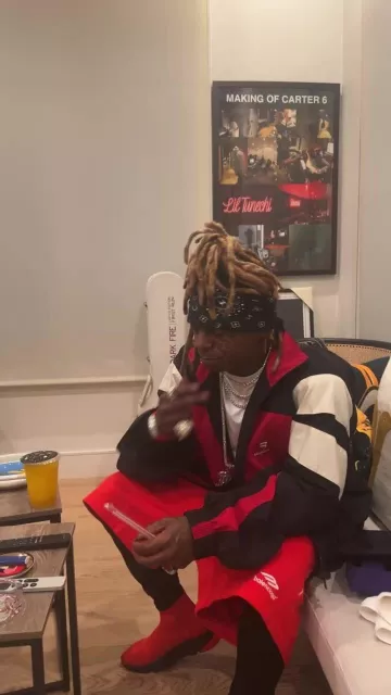 Balenciaga Black, Red & White Sporty B Track Jacket worn by Lil Wayne on the Instagram account @liltunechi