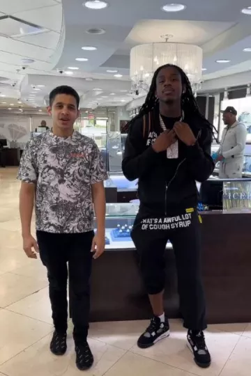 Thats A Awful Lot Of Cough Syrup Black Classic Logo Sweatpants worn by Polo G on the Instagram account @icebox