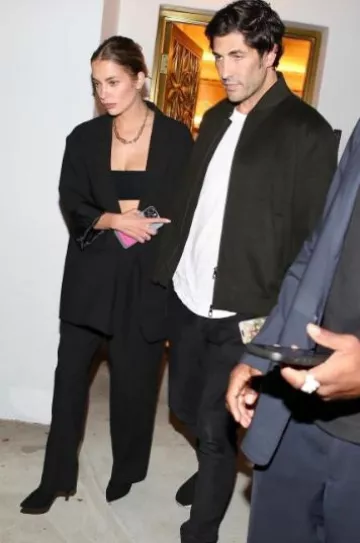 Stuart Weitzman The Wren Boot worn by Ashley Benson at Leaving a Party on September 15, 2024