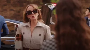 Saint Laurent Manhattan Leather And Canvas Shoulder Bag worn by Sylvie Grateau (Philippine Leroy-Beaulieu) as seen in Emily in Paris (S04E09)