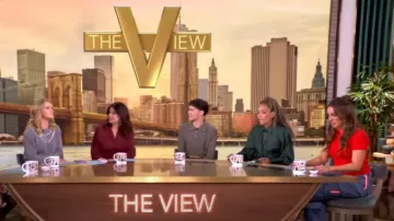 Alice + Olivia Olympia Mid-Rise Baggy Cargo Jeans with Side Stripes worn by Alyssa Farah as seen in The View on September 13, 2024