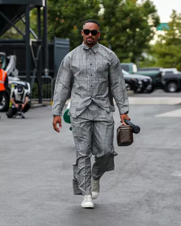 Marni White, Deep Blue & Brown Check Pleated Pants worn by Jalen Hurts on the Instagram account @philadelphiaeagles