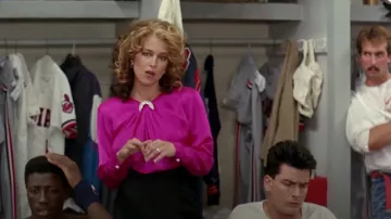 Outfits of Major League Movie: Rachel Phelps (Margaret Whitton) is wearing Pink Silk Blouse