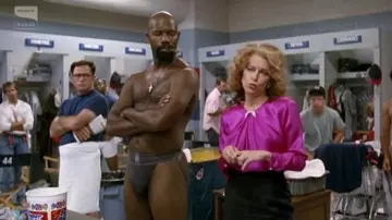 Outfits of Major League Movie: Rachel Phelps (Margaret Whitton) is wearing Pink Silk Blouse