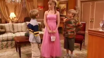 Outfits of The Suite Life of Zack & Cody: Maddie Fitzpatrick (Ashley Tisdale) wears Pink Formal Spaghetti Strap Iridescent Chiffon Dress in season 1, episode 3