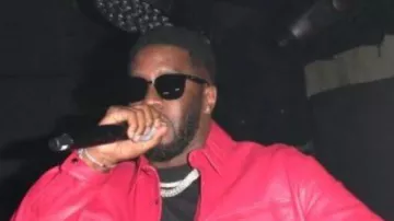 Sean Diddy Combs wears Red jacket performing at Under the Bridge, the West London live music venue on July 09, 2022