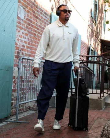 Givenchy Cream Givenchy 1952 Long Sleeve Polo worn by Jalen Hurts on the Instagram account @philadelphiaeagles