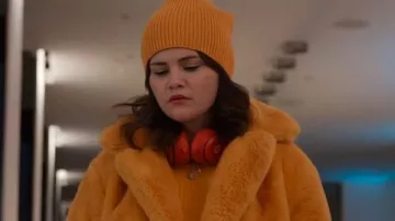Outfits of Only Murders in the Building: Eva Longoria wears Orange Fur Jacket in season 4, episode 5 of the TV series