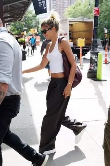 Loewe Medium Squeeze Bag in Nappa Mellow Lambskin worn by Zendaya Coleman in New York City on September 22, 2024