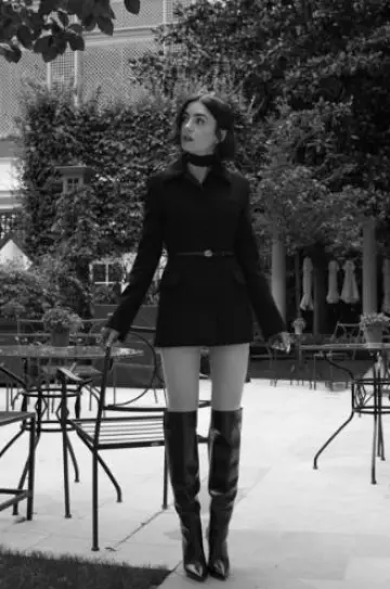 Christian Louboutin Astrilarge Botta Calf Leather Knee-High Boots worn by Lily Collins in Emily in Paris Season 4 Press on September 11, 2024