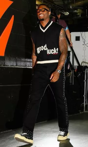 Jeans Amiri Black Studded Star porté par Tee Higgins sur le compte Instagram @bengals