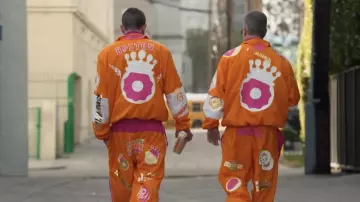 Ben Affleck and Matt Damon are wearing Boston ‘The DunKings’ Tracksuit in 2024 Dunkin’ Super Bowl Advertising with Tom Brady, Jack Harlow, Jennifer Lopez, & Fat Joe