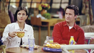 Friends TV series furniture: Monica Geller (Courteney Cox) is using Printed yellow mug cup in season 7, episode 24