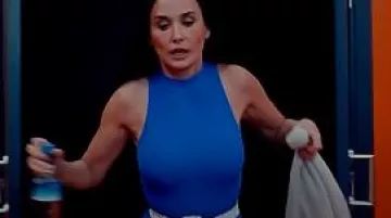 Outfits of The Substance Movie: Demi Moore wears Blue Bodysuit to portray Elisabeth Sparkle