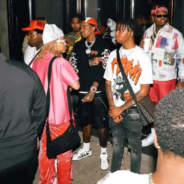 Amiri Black Leather Tactical Cargo Shorts worn by Wheezy on the Instagram account @wheezy