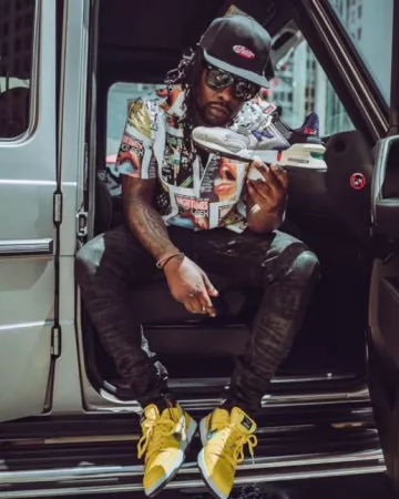 Nike Dunk Low x Diamond Supply Canary Yellow portée par Wale sur le compte Instagram @wale