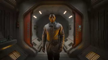 Costumes of Alien: Romulus Movie: Andy (David Jonsson) wears Grey Futuristic Jumpsuit