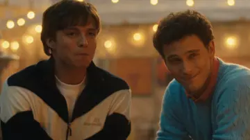 Wardrobe of Monsters TV series: Lyle Menendez (Nicholas Chavez) wears Sergio Tacchini track jacket in blue and white in season 1
