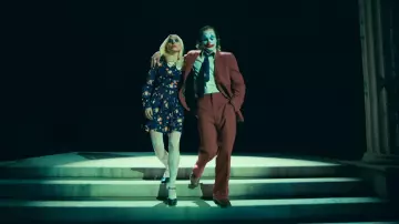 Get the looks of Joker: Folie à Deux: Lee Quinzel (Lady Gaga) wears Diamond Patterned withe Tights with blue floral dress