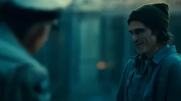 Wardrobe of Joker: Folie à Deux: Joaquin Phoenix is wearing green beanie in jail to portray Arthur Fleck
