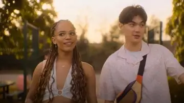 ASOS Design Plunge Halter Crop Top with Ring Detail in Green Sketch Floral worn by Elle Argent (Yasmin Finney) as seen in Heartstopper (S03E02)