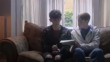 The Mens Store at Sears Vintage Grandpa Cardigan worn by Charlie Spring (Joe Locke) as seen in Heartstopper (S03E04)