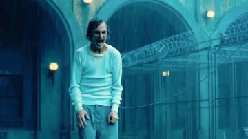 Joaquin Phoenix wears White Long Sleeve Top to portray Arthur Fleck in Joker: Folie à Deux movie