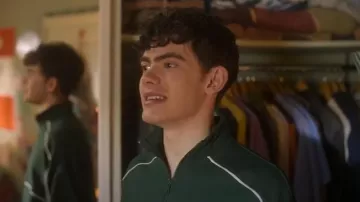 ASOS Design Oversized Half Zip Sweatshirt with Piping in Dark Green worn by Charlie Spring (Joe Locke) as seen in Heartstopper (S03E06)