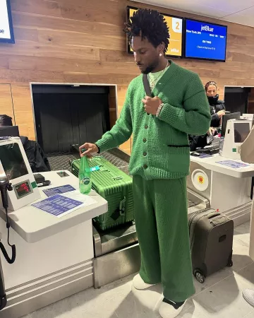 Rimowa Green Aluminum Trunk Plus Suitcase worn by Saint Jhn on the Instagram account @saintjhn