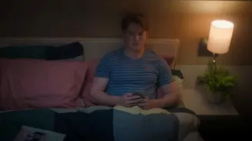 Levis T-Shirt in Navy Stripe with Small Batwing Logo worn by Nick Nelson (Kit Connor) as seen in Heartstopper (S03E08)
