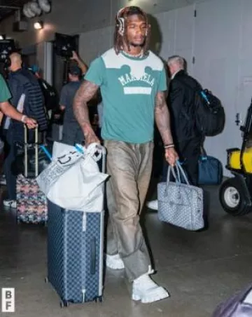 Prada White Cargo Pocket Monolith Boots worn by CeeDee Lamb on the Instagram account @dallascowboys