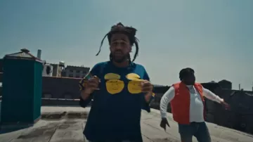 Kapital Navy Four Smiley Football T Shirt worn by J. Cole in Tee Grizzley - Blow for Blow (feat. J. Cole) [Official Video]