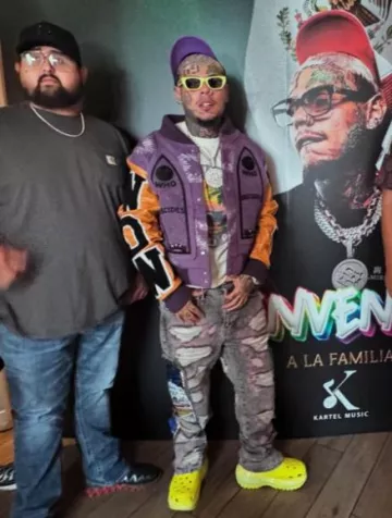 Who Decides War Purple & Orange Stained Glass Varsity Jacket worn by 6ix9ine on the Instagram account @6ix9ine