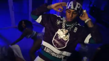 Bape x Mitchell & Ness Anaheim Ducks Purple Camo Jersey worn by NLE Choppa in NLE Choppa - Gang Baby (Official Music Video)