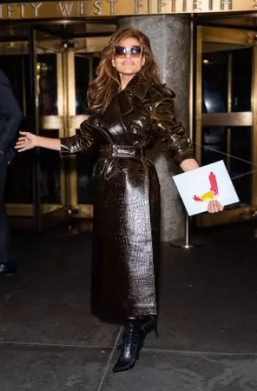 Stella McCartney Crocodile Embossed Trench Coat worn by Eva Mendes in New York City on September 18, 2024