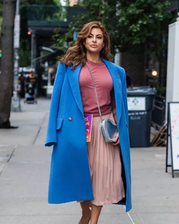 Stella McCartney Falabella Heart Crossbody Bag worn by Eva Mendes in New York City on September 18, 2024