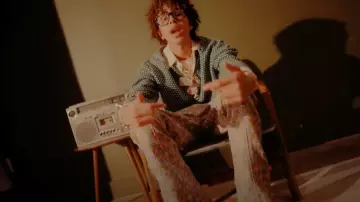 Drôle De Monsieur Green & White Patterned Polo Sweater worn by Luh Tyler in Luh Tyler - Been Working [Official Music Video]