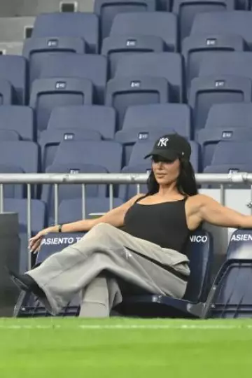 Skims Fits Everybody Cami Bodysuit in Onyx worn by Kim Kardashian at Real Madrid and Real Valladolid on August 25, 2024
